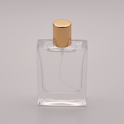 50 ml płaska szklana butelka perfum z małą złotą nasadką